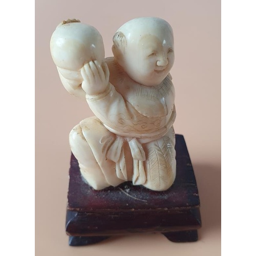 275 - Early 20th Century Carved Ivory Chinese Figure on a Hardwood Stand