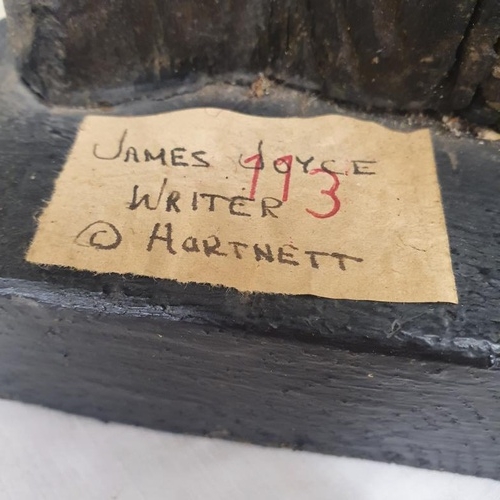 357 - Bog Oak or Yew sculpture of James Joyce. Label behind. c. 22ins tall