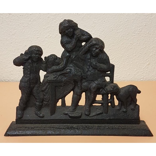 87 - 19th Century cast iron door stop depicting family gathered around a table with goose and dog.-c10.5i... 