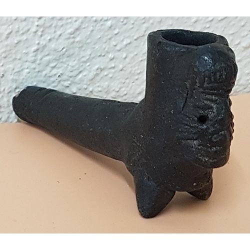 95 - Ceramic Pipe (possibly 18th Century) with tribal face mask. 12cm long by 6cm tall