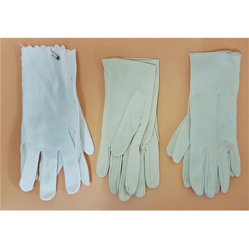 111 - Historical Interest: 3 pairs of Lady's evening gloves. The tissue paper wrapping, which was used to ... 
