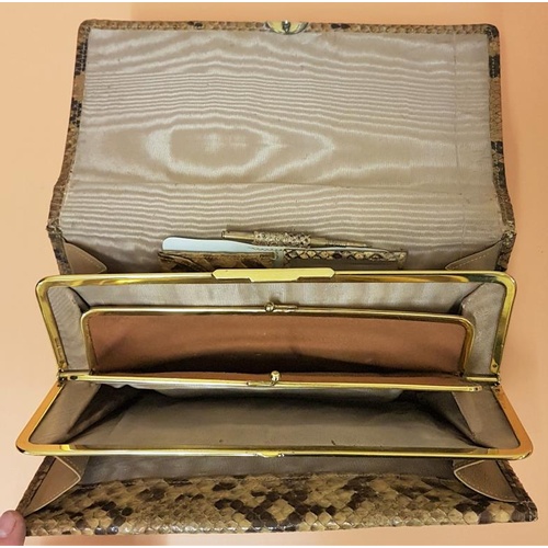 171 - Snake Skin Bag with Silver Clasp (London 126). Silk lined, fitted interior, coin purse, mirror, note... 