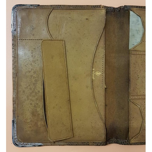 202 - London 1894 - A Good Snakeskin and Silver Wallet with pig skin interior and gilt Calendar