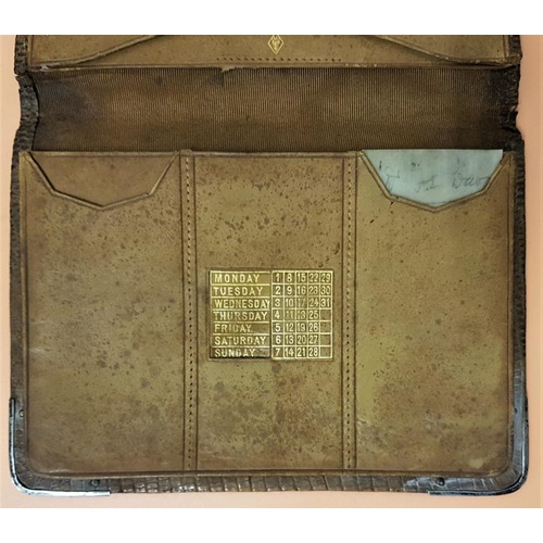 202 - London 1894 - A Good Snakeskin and Silver Wallet with pig skin interior and gilt Calendar