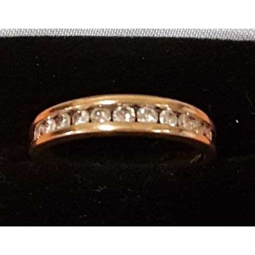 246 - 9ct Gold Diamond Ring with eleven graduated Diamonds, size S