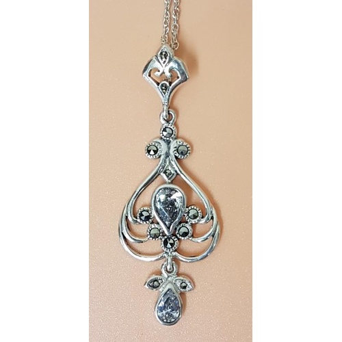 260 - 925 Silver and Zircona Pendant and Silver Chain.- 7 grams