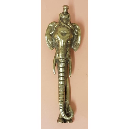 392 - Early 20th Century Brass Door Knocker in the form of a mounted elephant. - 17.5cm long x 5cm diamete... 