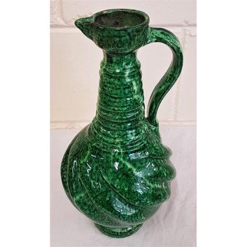 404 - Antique pottery green glazed ewer jug, 13