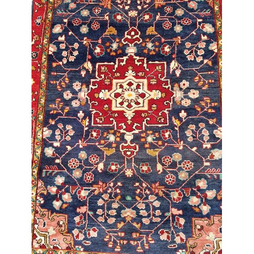 444 - Handmade Iranian wool carpet. Floral Pattern with central medallion design. Mid 20th Century. Good p... 