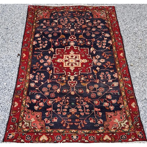 444 - Handmade Iranian wool carpet. Floral Pattern with central medallion design. Mid 20th Century. Good p... 