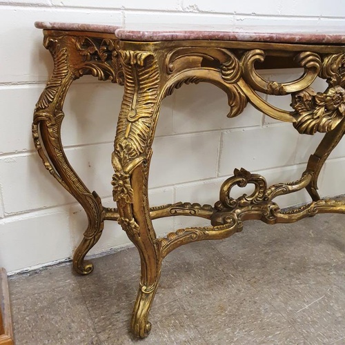468 - Highly Decorative Carved and Gilded Consol Table with a Pink Vein Marble Top, c.55in wide, 23in deep... 