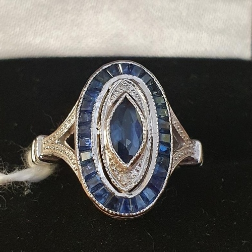 234 - Luke Stockley, London (Jeweller) Superb 9ct white gold, diamond and sapphire ring in the Art Deco St... 