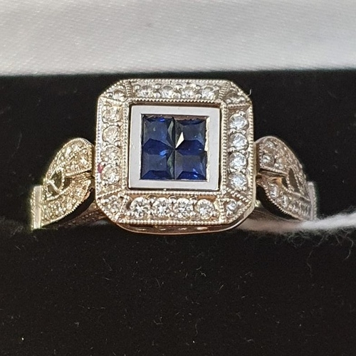240 - Stunning 18ct White Gold Diamond and Sapphire Ring. Four Central square cut sapphires surrounded by ... 