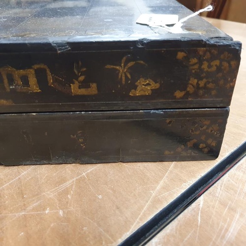 277 - 19th Century Chess/Draughts/Backgammon board in the Chinese manner. The ebonised case with gilt chin... 