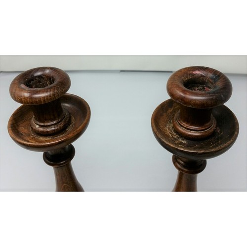 4 - A lovely pair of late 19th Century /early 20th Century turned oak candlesticks good patina... 
