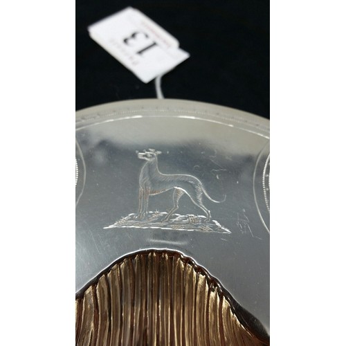 13 - 19th Century Silver plated scallop dish with engraved Irish Wolfhound. The entire resting on three c... 