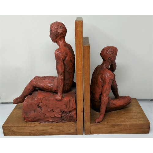 16 - A superb pair of hand sculptured oversized figures on oak bases. Monogram and date 64- possibly Dani... 