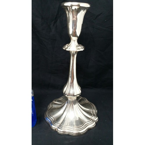22 - A good pair of early 20th Century Silver plated Candlesticks in much loved condition 9 inches t... 