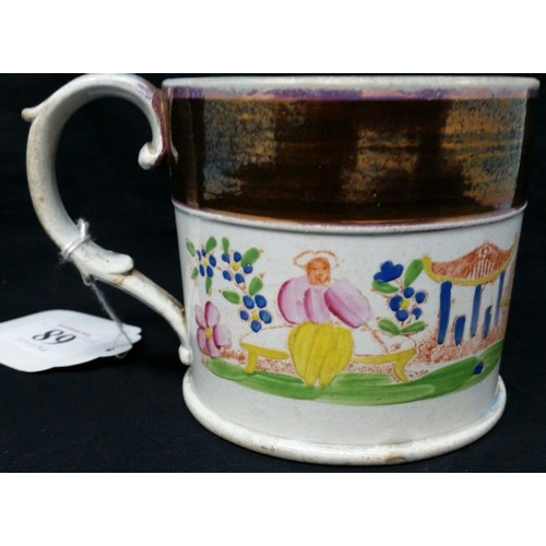 68 - An early 19th Century mug with part lustre decoration and hand painted pictorial scene circa&nb... 