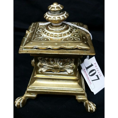 107 - A superb mid 19th century heavy quality brass inkwell resting on four splayed lion paw feet dec... 
