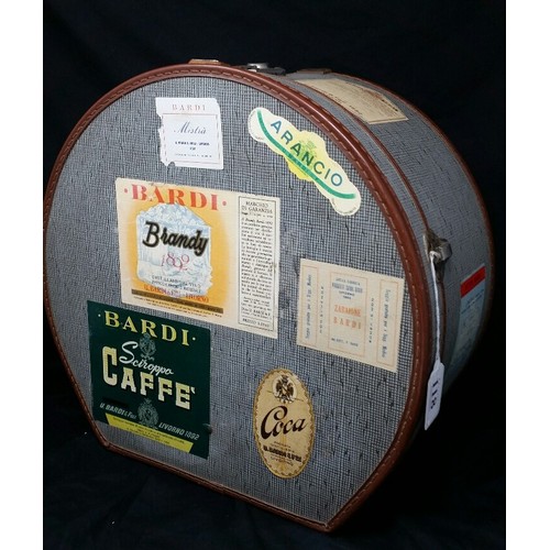 118 - A good vintage hat box with associated advertising stickers. Overall condition is very good.