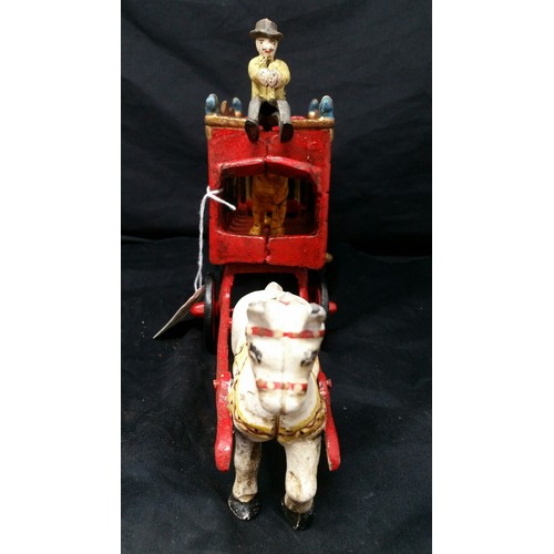 127 - A heavy quality cast iron circus trailer with tiger within- coach driver and circus horse – ov... 