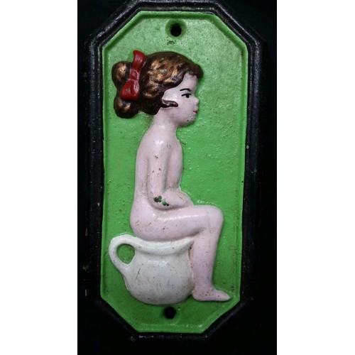 128 - A good pair of heavy cast iron boy and girl bathroom / toilet signs . Both 7 inches tall x... 
