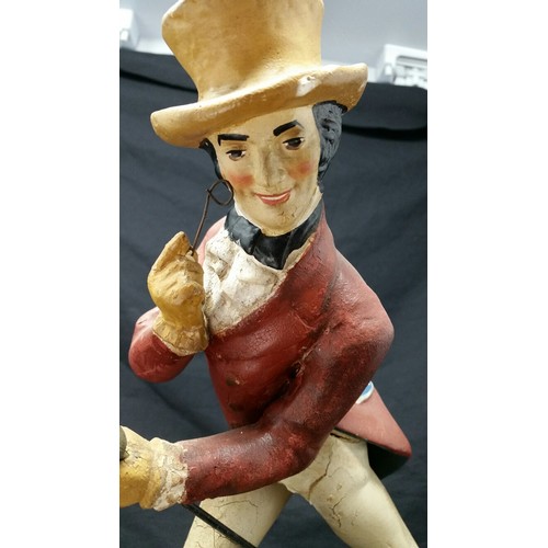 131 - Early 20th Century rubberized Johnnie Walker pub figure. 13.5 inches high x 9.25 inches wide. H... 