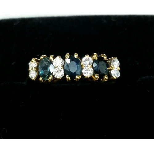 142 - 18ct gold diamond & sapphire ring. Three oval sapphires and eight diamonds. Ring Size O&nbs... 