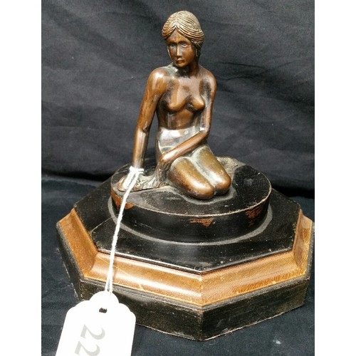 223 - Art deco bronze effect figure on a part ebonized wooden base. Good patina. Size 6 inches tall x 5.75... 