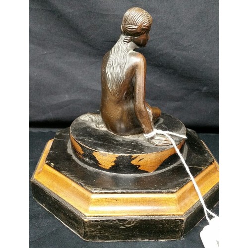 223 - Art deco bronze effect figure on a part ebonized wooden base. Good patina. Size 6 inches tall x 5.75... 