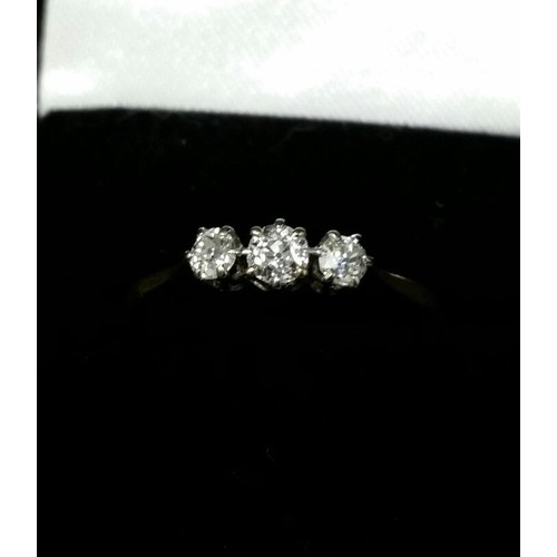 226 - 18ct Gold three stone diamond ring. Diamonds set within a platinum mount. Approx diamond weight .33c... 