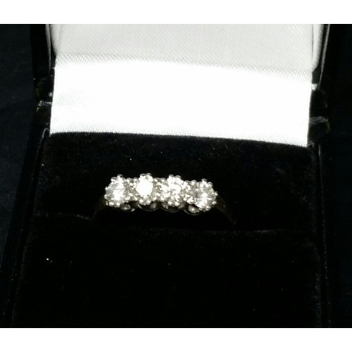 227 - A good 18ct gold 4 stone diamond ring set in white gold mount. Approx. .75ct diamond weight. Good br... 