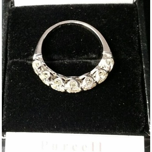 228 - A good 7 stone platinum diamond ring Approx 1.75 CT diamonds Good sparkle from diamonds. All stones ... 