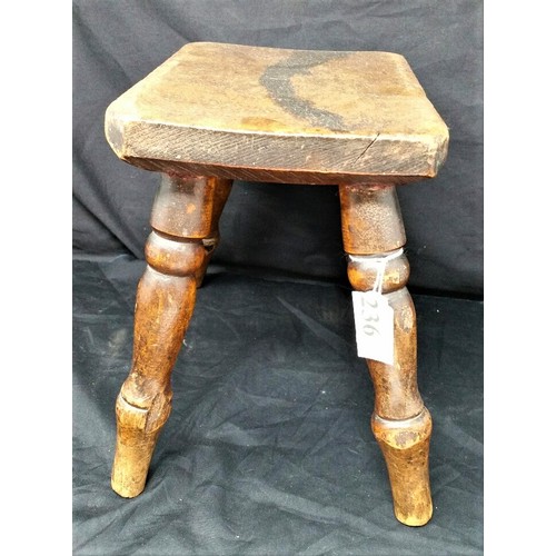 236 - 19th Century 4 legged Ash or Larch milking stool. 9 inches high x 10.5 inches wide. A good used stoo... 