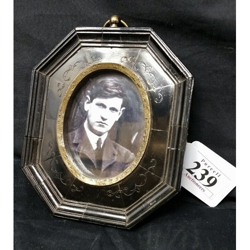 239 - A framed miniature portrait of a young Michael Collins 5.5 inches high + brass ring x 4.5 inches wid... 