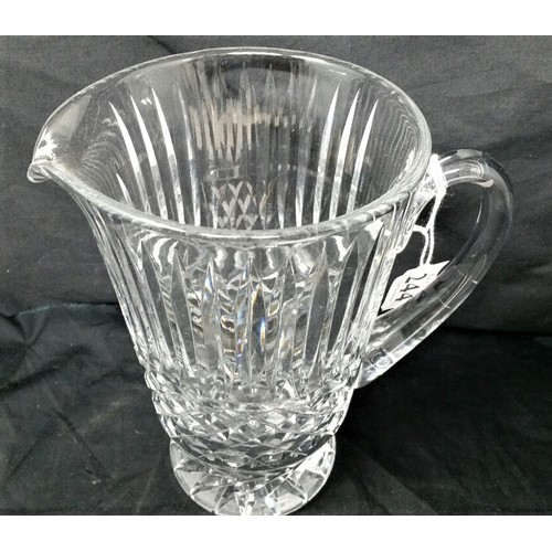 244 - A substantial Waterford Crystal Water Jug standing 8 inches tall. Excellent condition no chips or ni... 