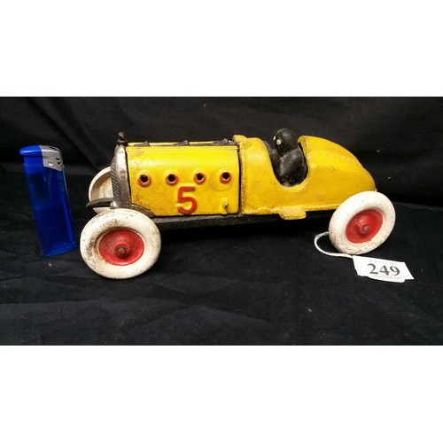 249 - A very heavy cast iron racing car 9.25 inches long x 3.5 inches high – a antiqued version of t... 