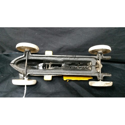 249 - A very heavy cast iron racing car 9.25 inches long x 3.5 inches high – a antiqued version of t... 