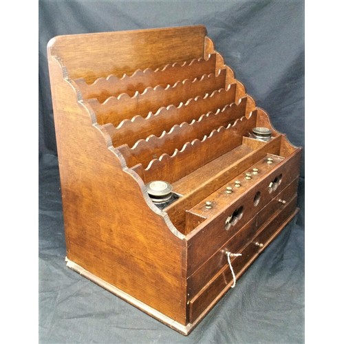 254 - Exceptional 19th Century Oak Stationary cabinet of waterfall design Fitted with three drawers and pr... 