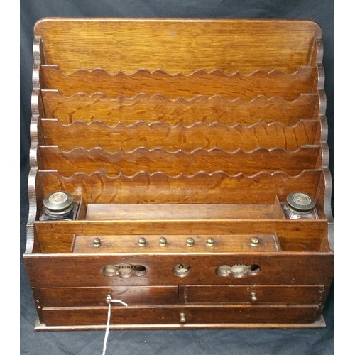 254 - Exceptional 19th Century Oak Stationary cabinet of waterfall design Fitted with three drawers and pr... 