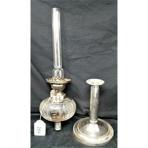 255 - A very nice 19th century silverplated oil lamp of slender proportions with cutglass bowl. The silver... 