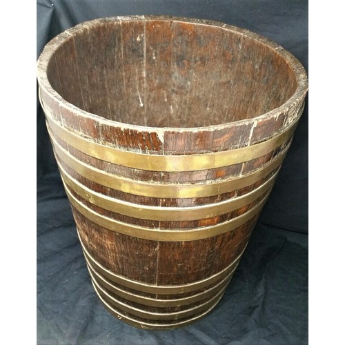 256 - A good 19th Century brass bound peat bucket of oval form. 15 inches tall x 14.5 inches diameter. The... 
