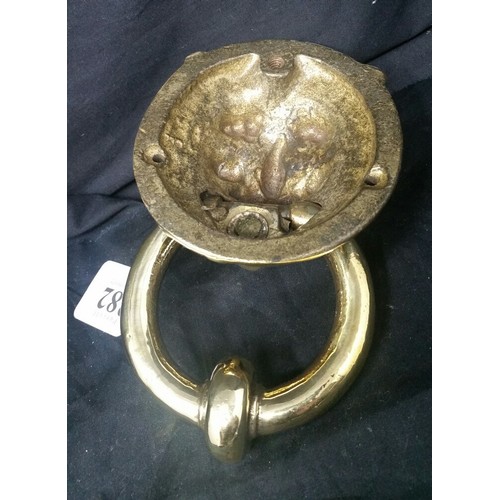 282 - A 19th century lion head door knocker lovingly restored but no reused. Metallic paint behind to pres... 