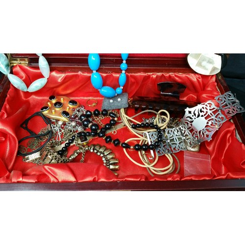 296 - A modern jewellery box and contents including necklaces sliver plated bracelet and costume jewellery... 