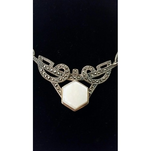 297 - A 925 Silver necklace with matt finished off white stone. Necklace length 16 inches. Total weight 16... 