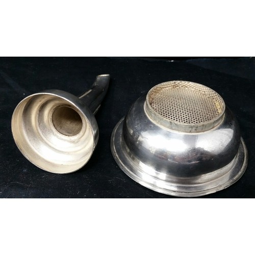 299 - An early to mid-20th Century silver plated wine funnel with strainer by the good maker Rodgers &... 