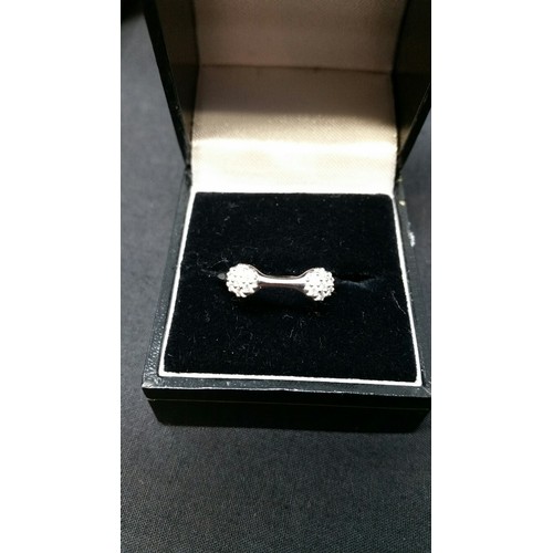 293 - 18ct white gold and diamond double pod love ring. Each pod with 7 small diamonds. Size N.
