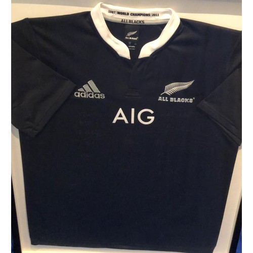 667 - All Black Rugby Squad 2011-2015. Signatures include Richie Mc Caw (Capt) and Dan Carter both World R... 