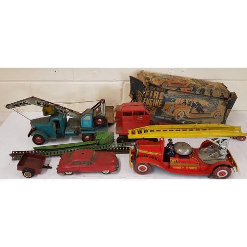 117 - Mettoy Clockwork Fire Engine 3110-3, Schuco Ingenico Car and Trailer, along with 2 Tin Plate Cranes